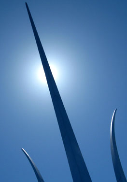 The sun behind the Air Force Memorial in Washington, DC