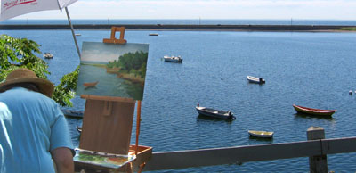 Can you say picturesque??  An art class or group paints the town's harbor red.