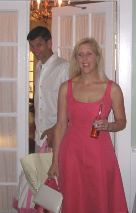 Dori and Aaron enter with gifts.