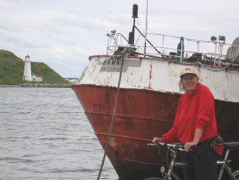 Small Island lighthouse guides boats into the harbor.